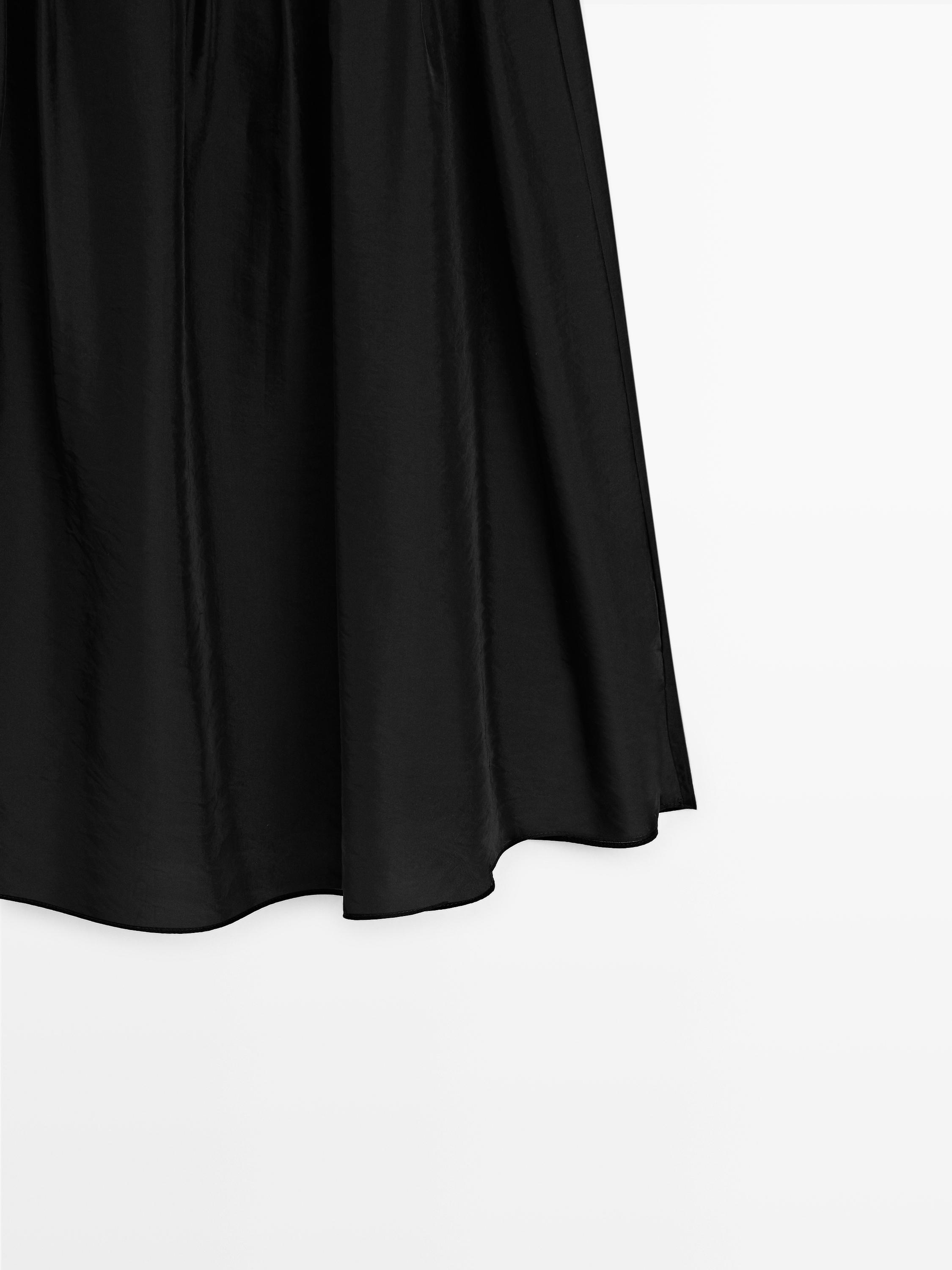 Flowing midi skirt with pintucks